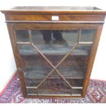 Small Edwardian inlaid mahogany wall mounted display cabinet with two shelves, enclosed by an