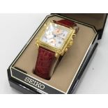 Seiko SQ100 quartz chronograph alarm with date. Square gold plated case on original leather strap