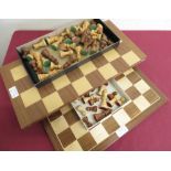 Two turned wooden chess sets on chessboards, one folding (kings H7.5cm)