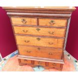 Late 18th C oak chest on stand with two short and three long feather banded drawers, above three