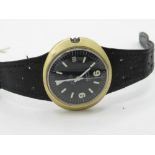 Omega Geneve Dynamic automatic wristwatch with date. Gold plated case on rally style leather