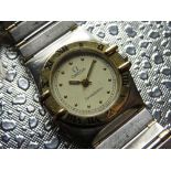 Omega lady?s Constellation quartz wristwatch. Stainless steels case with gold plated bezel
