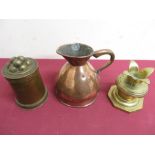 Copper measuring jug with makers label, a pewter lidded container and a sectional brass alter