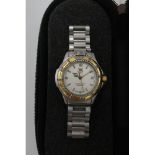 Ladies Tag Heuer professional 200 stainless steel quartz wrist watch, with baton numerals and date