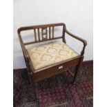 Edwardian inlaid mahogany piano stool with raised back and hinged upholstered seat on square