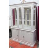 White finish side cabinet with two glazed doors with mirrored back above two panelled doors (