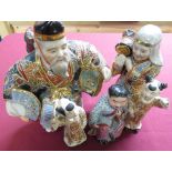 Five Chinese pottery figures with two digit mark to the base