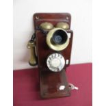 Vintage "Conversation Pieces" wall mounted telephone with separate ear piece