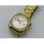 Le Courier hand wound wristwatch alarm with date. Gold plated case on water expanding bracelet. Case