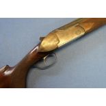 Basque 12 bore over & under single trigger ejector shotgun with 26 inch barrels, choke 3/4 & IC,