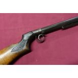 Vintage BSA .22 break barrel air rifle, the part checkered stock carved BSA