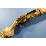 Escort Magnum 12 bore semi auto shotgun in woodland camouflage finish, 29 inch barrel, choke 1/2