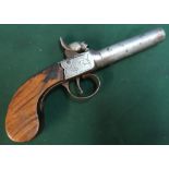 19th C percussion cap pocket pistol with 3 inch turn off barrel and engraved scrollwork to the top