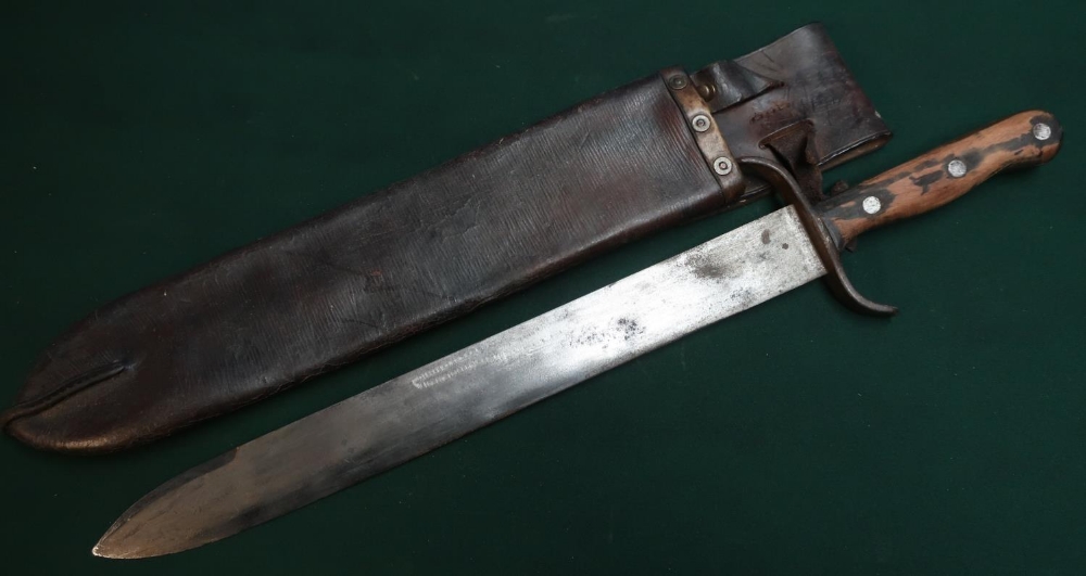 Military heavy bladed machete type Austrian side arm stamped with crest to the 15.5 inch blade