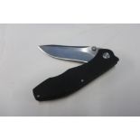 Outis folding field knife with 2 3/4 inch blade and black handle