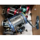 Abu Ambassadeur 9000 sea fishing reel, another two similar reels, a Mitchell 6/gl etc (one box)