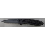 As new Whitby Knives folding knife, 1/4 inch blade with pierced camo handle