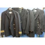 Selection of various assorted naval military uniforms including blazers, jackets, etc with various