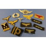 Collection of various German embroidered and other cloth badges, lapel badges, etc, and three