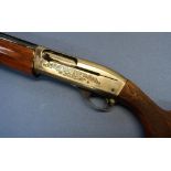 Remington 1100 12 bore semi auto left hand shotgun with 27" barrel, choke 1/2", 13" pistol grip