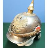 Circa WWI Prussian pikelhaube full bodied steel helmet with lobster style tail with central brass