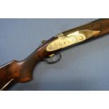 Cased Beretta 687 EELL sporting 12B over and under sidelock ejector shotgun, with 28 inch multichoke