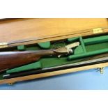 Cased W.W. Greener no.25, 12B side by side box lock ejector shotgun, with 25 inch barrels, choke 3/4