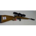 Magtech 8122 bolt action .22 rifle fitted with sound moderator and Leapers 6x42 scope, serial no.