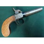 Percussion cap pocket pistol with 2 3/4 inch turn off barrel and engraved scrollwork detail to