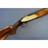 Rizzini 12B over and under side plated ejector shotgun, with 28 inch barrels with raised top