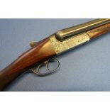 AYA No25 12 bore side by side boxlock ejector 25" barrels with raised rib and gilt AYA inlay detail,