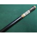 Early 20th C Indian ebonised swagger type cane with carved horn and bone grip and lions head pommel,