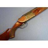 Baikal 12B over and under ejector shotgun with 29 inch barrels, 14 1/2 inch pistol grip stock,