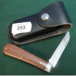 Sheffield made singe bladed pocket knife with polished wood grips and leather belt pouch