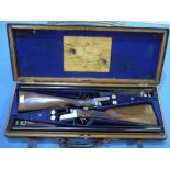 Cased pair of Vickers-Armstrongs Ltd London 12 bore side by side ejector shotguns with 28 inch