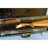 Cased Miroku 12B over and under ejector shotgun, with additional set of barrels, with 30 inch