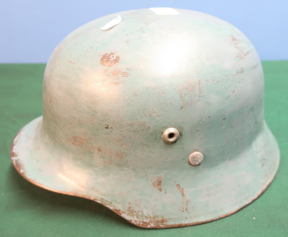 WWII period Hungarian steel helmet complete with leather liner in blue/grey finish, complete with