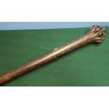 Extremely large wooden Fijian war club, with bulbous head with carved rib detail, inset with