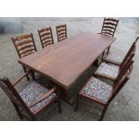 Cryercraft elm refectory style dining table W92cm L210cm and a set of eight ladder back chairs
