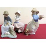 Nao figure of a girl with three rabbits, model of a girl seated with a puppy and another with a