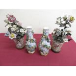 Pair of Dresden flower encrusted bottle shaped vases with blue crossed swords mark and a pair of