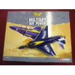 Three boxed Corgi military air power and jet fighter power die cast figures including two F4