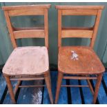 Pair of light wood chapel type chairs (2)