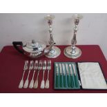 Case set of butter knives, silver plated forks, silver plated teapot and a pair of plated candle