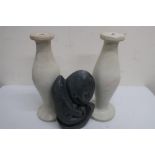 Grey carved soapstone model of two entwined faces and a pair of polished soapstone type table lamp