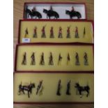 Collection of painted lead military miniatures including Kings Own Scottish Border Regiment Colour