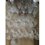 Two lead crystal decanters, set of four wines with plum tint stems, four lead crystal brandy