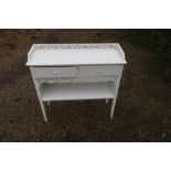 White painted two tier two drawer side table with raised fret work back and sides W80cm D29cm H80cm