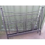 Black metal framed double bedstead