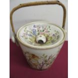 Victorian slop pail, body decorated with pink and yellow flowers, with dished over and wicker